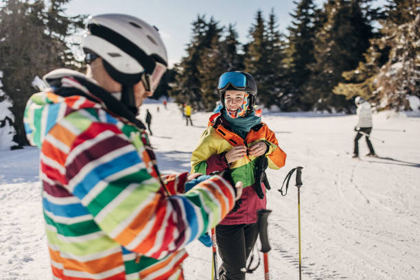 istock Father and daughter on skiing 1372325743