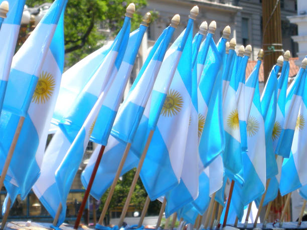 An array of Argentine flags flying at a tourist stall in Buenos Aires, Argentina