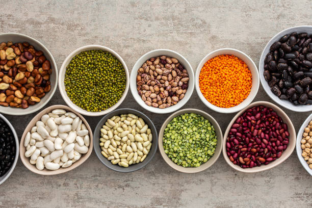 istock Different types of legumes in bowls 1372330264