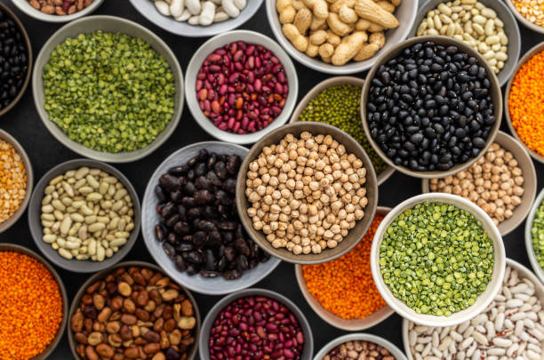 istock Different types of legumes in bowls 1372330270