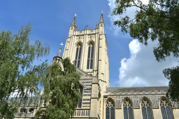 st edmundsbury cathedral, bury st edmunds, suffolk on a beautiful summers day - uk cathedral cemetery day imagens e fotografias de stock