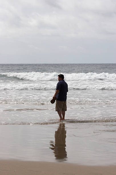 istock Man paddling at the seashore 137233189