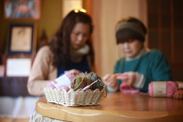 Image of a woman knitting