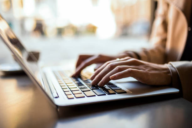 istock Girl typing on her laptop 1372333260