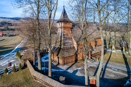 Debno, Poland. Medieval wooden Gothic church of the Saint Archangel Michael, built in 15th century, still active, with the oldest wooden polychrome in Europe inside. UNESCO World Heritage Site