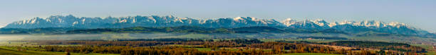 istock Wide spring panorama of Tatra Mountains 1372333808