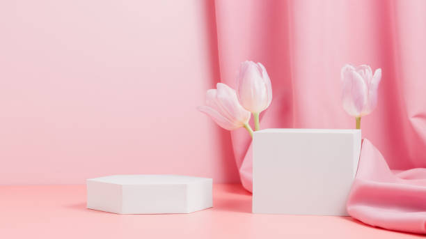 istock Banner with geometric podiums decorated with tulips and pink textile 1372334974