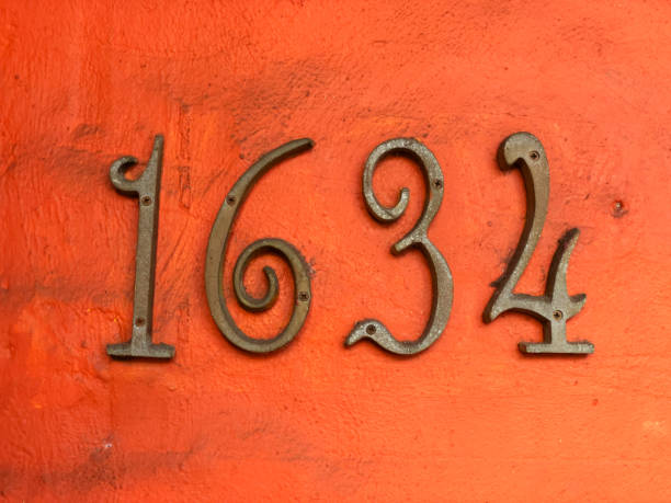 istock Vintage Numbers on Red Wall 1372335702