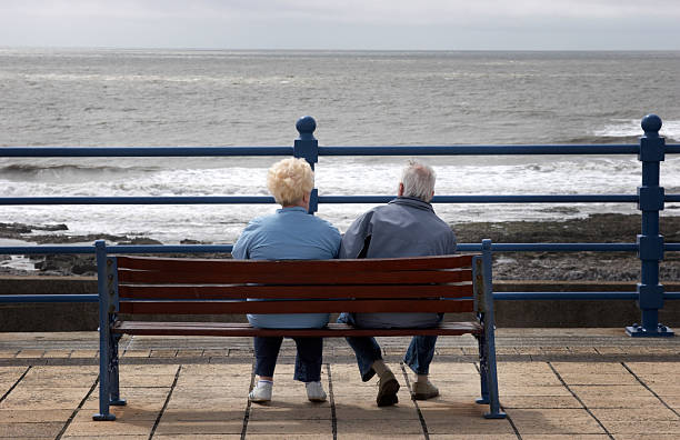 istock Couple looking out to sea 137233795
