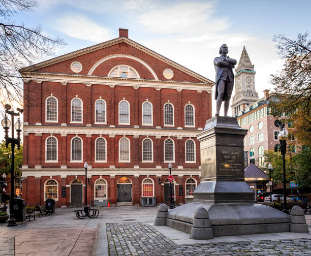 Boston Boston, MA, USA - September 10, 2018: view of the historic architecture of Boston in Massachusetts, USA showcasing the Quincy Market and Faneuil Hall building at Government Center with lots of locals and tourists passing by. north end boston photos stock pictures, royalty-free photos & images