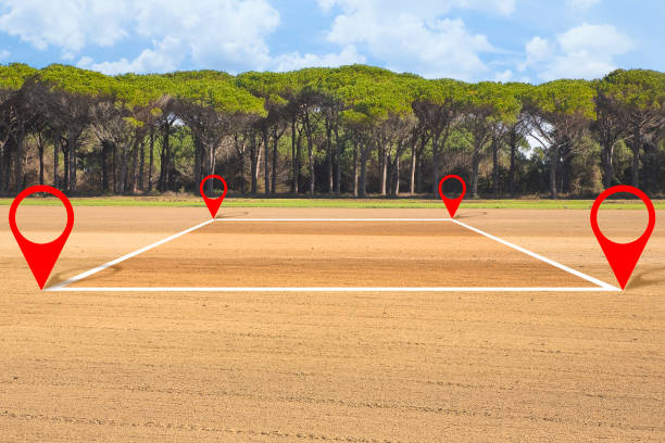istock Land plot management - real estate concept with a vacant land available for building construction and housing subdivision in a residential area for sale, rent, buy or investment 1372343910