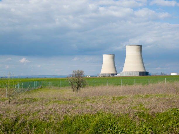 istock Thermal power plant chimneys 1372346839