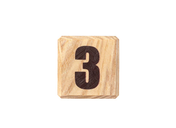 istock Wooden cube with number 3 isolated on white background. 1372350195