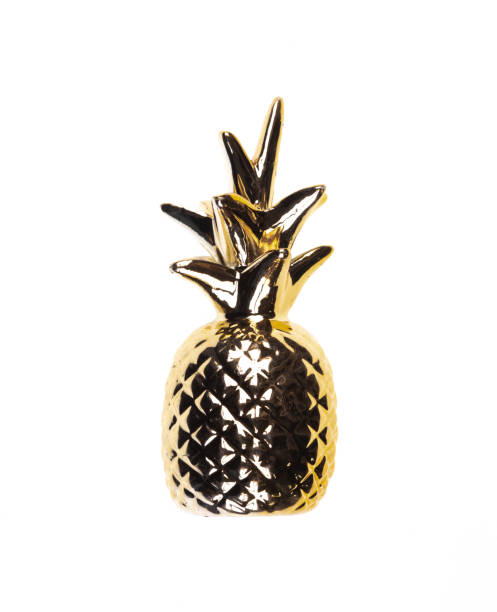 istock golden pineapple isolated on white background 1372350411