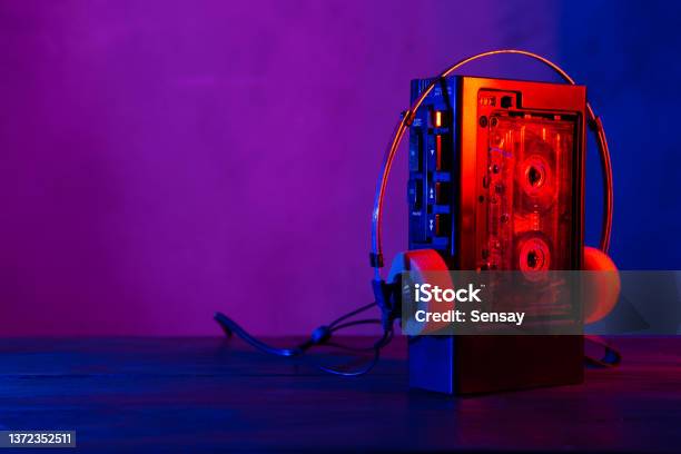 Vintage Cassette Tape Player In Neon Light 80s 90s Advertisement Style Disco Party Nostalgy Concept Stock Photo - Download Image Now