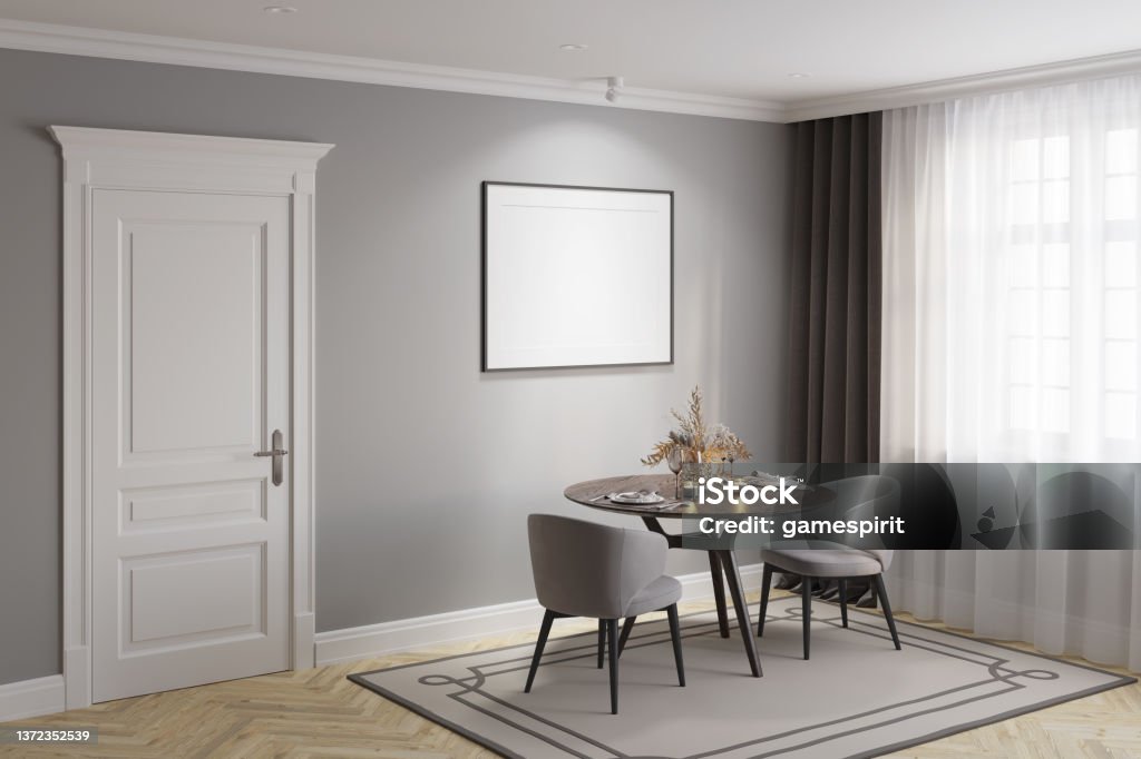 A gray modern classic dining room with a blank illuminated horizontal poster above a round wooden table with two elegant chairs, a white classic door, dark gray curtains near the window. 3d render Indoors Stock Photo