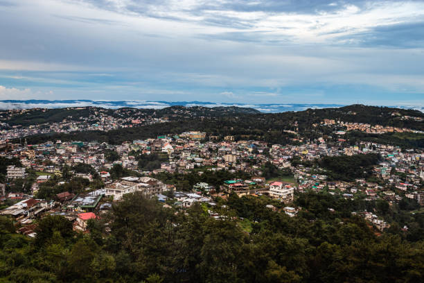 istock downtown city view with dramatic cloudy sky at evening from mountain top 1372352543