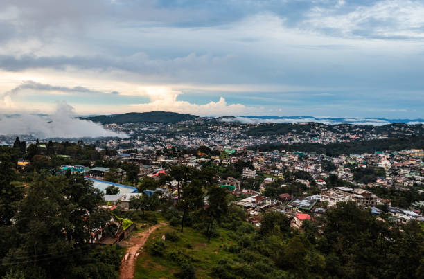 istock downtown city view with dramatic cloudy sky at evening from mountain top 1372352552