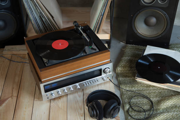 HiFi system with turntable, amplifier, headphones and lp vinyl records in a listening room stock photo