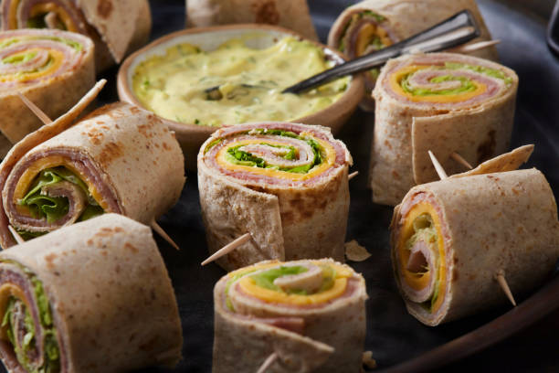 Ham, Lettuce and Cheese Pinwheel Sandwiches with a Mustard and Mayo Dip