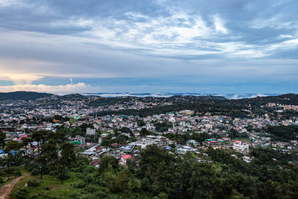 istock downtown city view with dramatic cloudy sky at evening from mountain top 1372354711