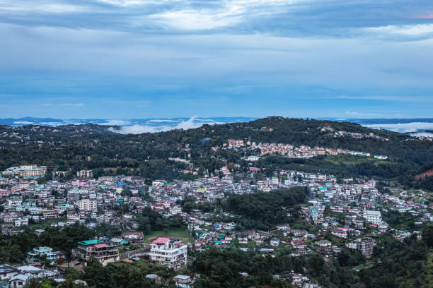 istock downtown city view with dramatic cloudy sky at evening from mountain top 1372354877
