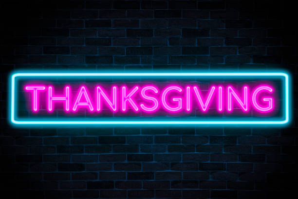 istock Thanksgiving neon banner on brick wall background. 1372359506