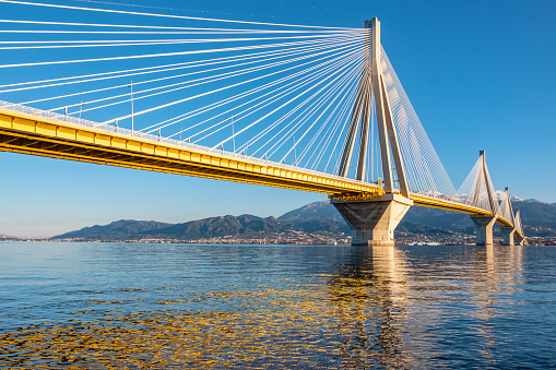 Patras, Greece - February 2, 2022: modern suspention Rion-Antirion Bridge across the Gulf of Corinth
