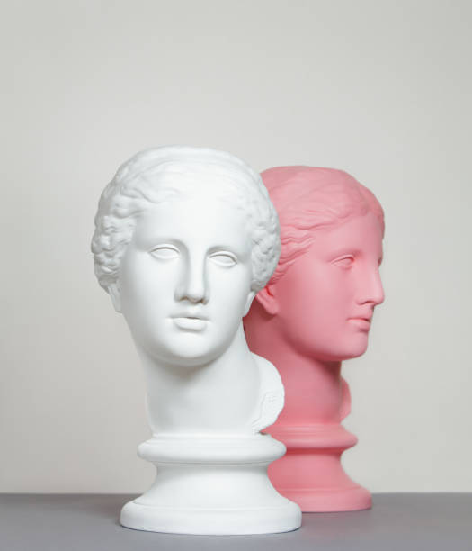 istock White and pink colored busts of Greek Goddesses 1372360950