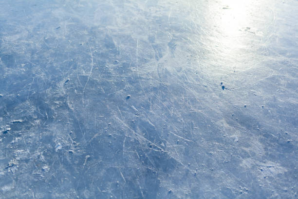 istock Empty ice rink with skate marks after the session outdoor. 1372361555