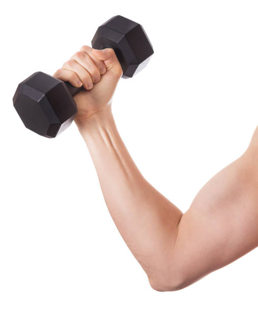 istock A man holds a dumbbell in his hand. White background 1372362641