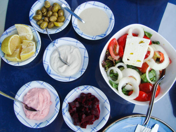 mediterranean cuisine. seafood. table setting. authentic greek meze style dishes on the table