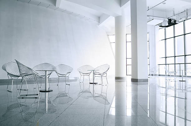 istock Metallic chairs in an empty white meeting room 137236719