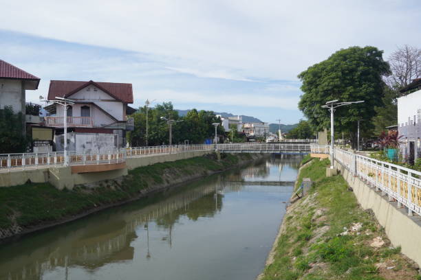 istock River pass across a town stock photo 1372367765