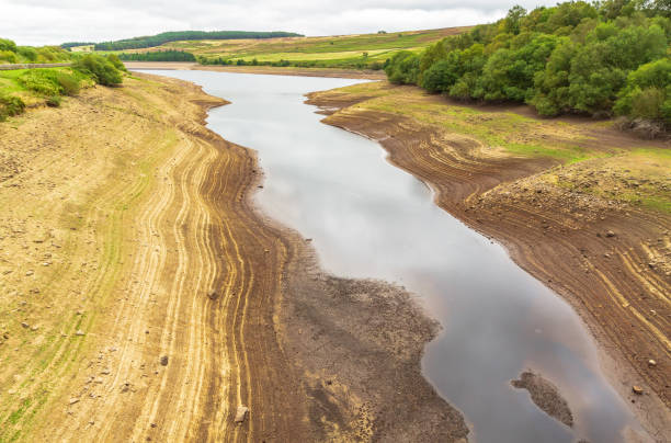 Leighton Reservoir in Nidderdale, North Yorkshire, UK, with very low water levels following a prolonged heatwave and no rainfall. stock photo