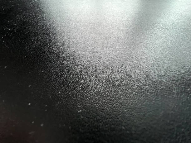 istock Very fine black leather as texture or background. 1372370223