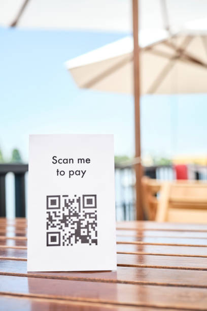 istock QR code for contactless, cashless payment, placed on the table of a restaurant. 1372371016