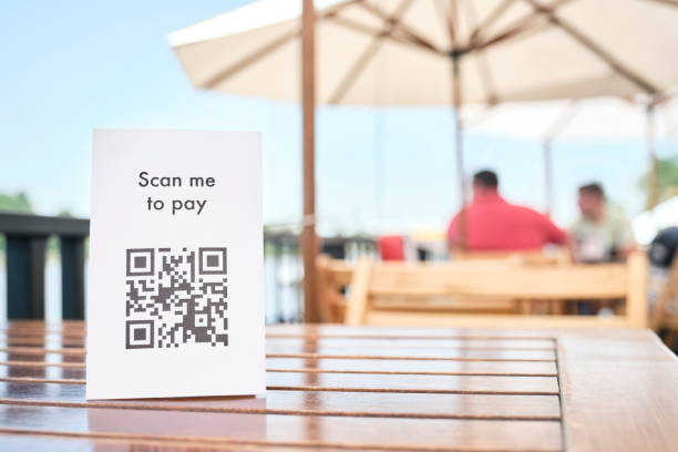 istock QR code for contactless, cashless payment, placed on the table of a restaurant. 1372371026