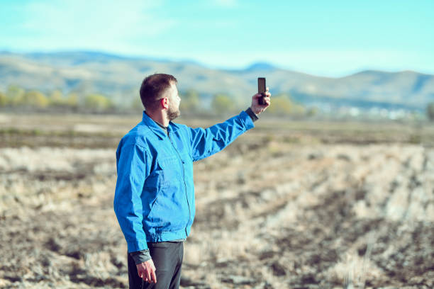 istock Selfie By Bearded Modern Farmer On Farm Field 1372371456