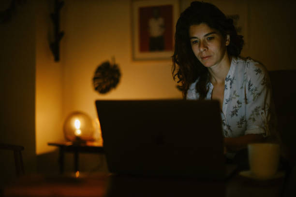 istock late night work at the laptop 1372372228