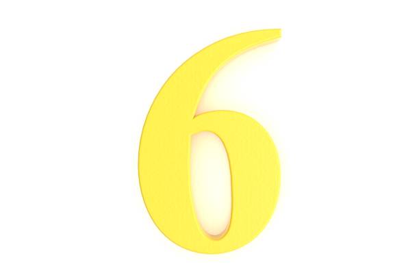 Yellow number six on white background