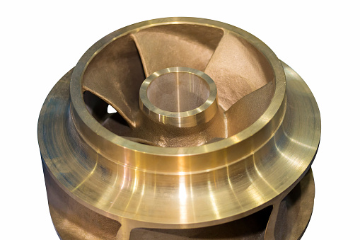 copper closed impeller of centrifugal pump for industrial isolated on white background with clipping path