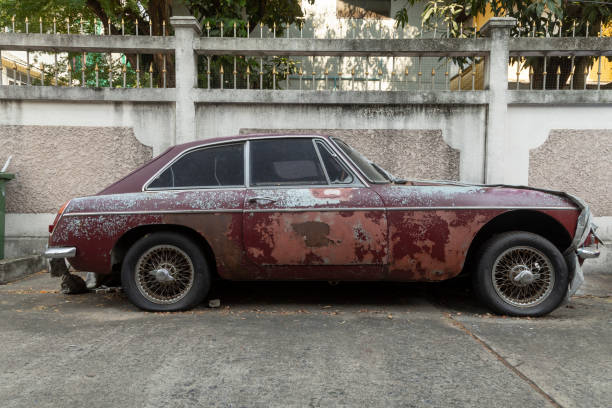 Buenos Aires, Argentina - December 28, 2017: Old car in bad condition parked in the street. Lots of cars in this conditions can be found all around the city
