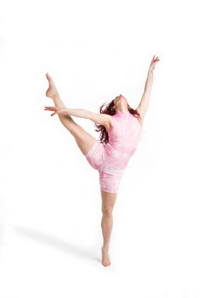 istock young woman dancer doing dance exercises on a white background 1372374360