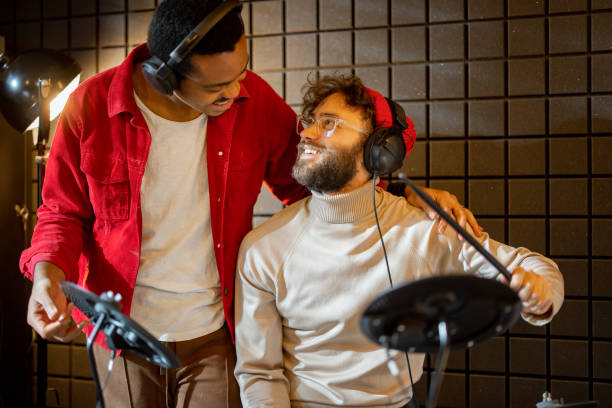 istock Men playing electric drums at home sstudio 1372376589