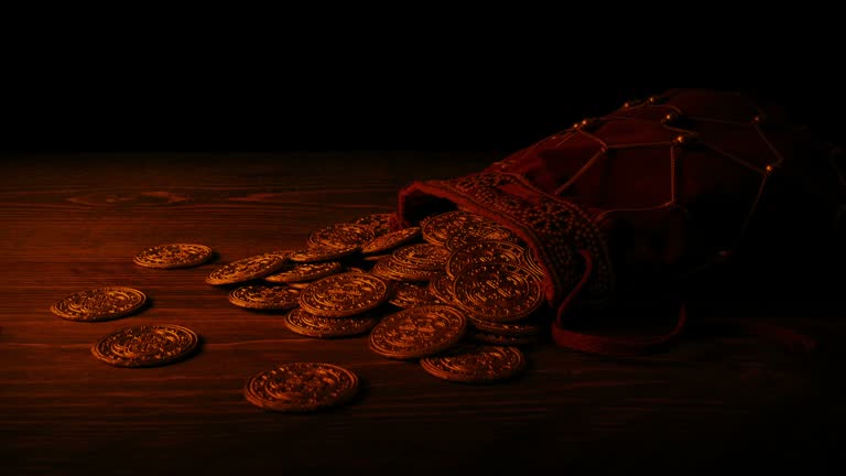 Passing Bag Of Gold Coins In Firelight Medieval Scene