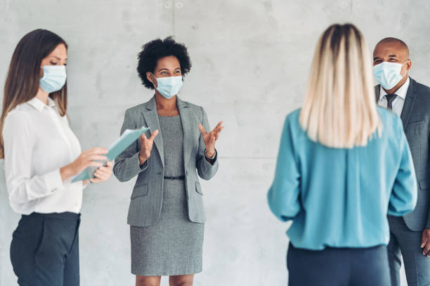 istock Business people working in the pandemics 1372378142