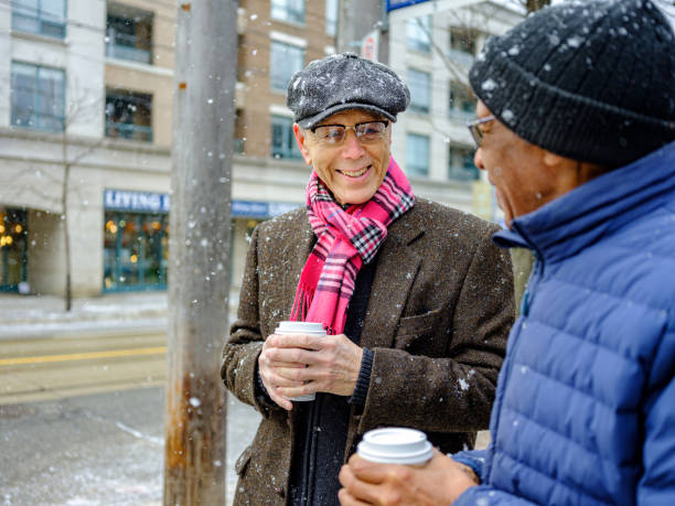 Senior men out for a winter walk and coffee