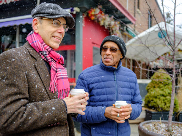 istock Senior men out for a winter walk and coffee 1372380562