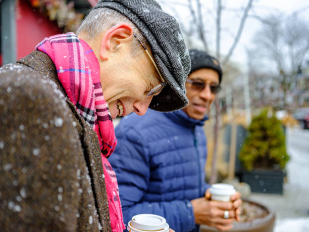 istock Senior men out for a winter walk and coffee 1372380596
